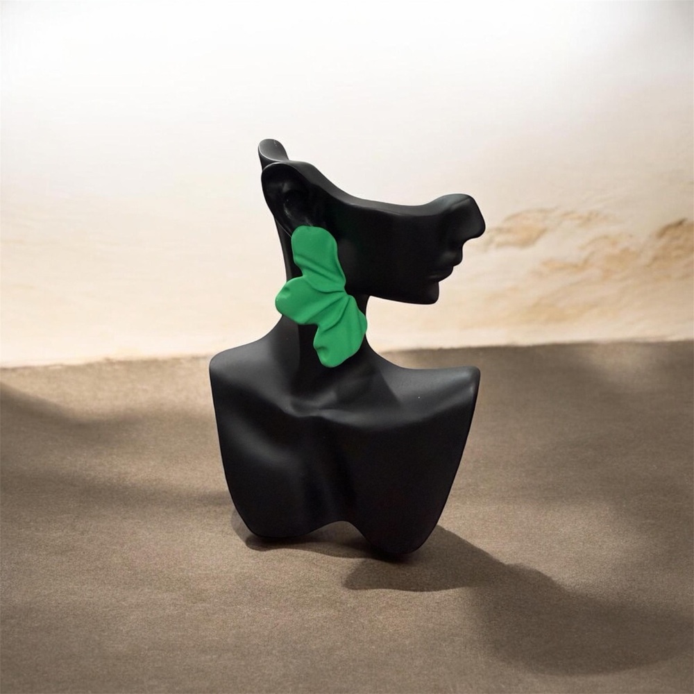 Black Abstract Sculpture with Green Accent
